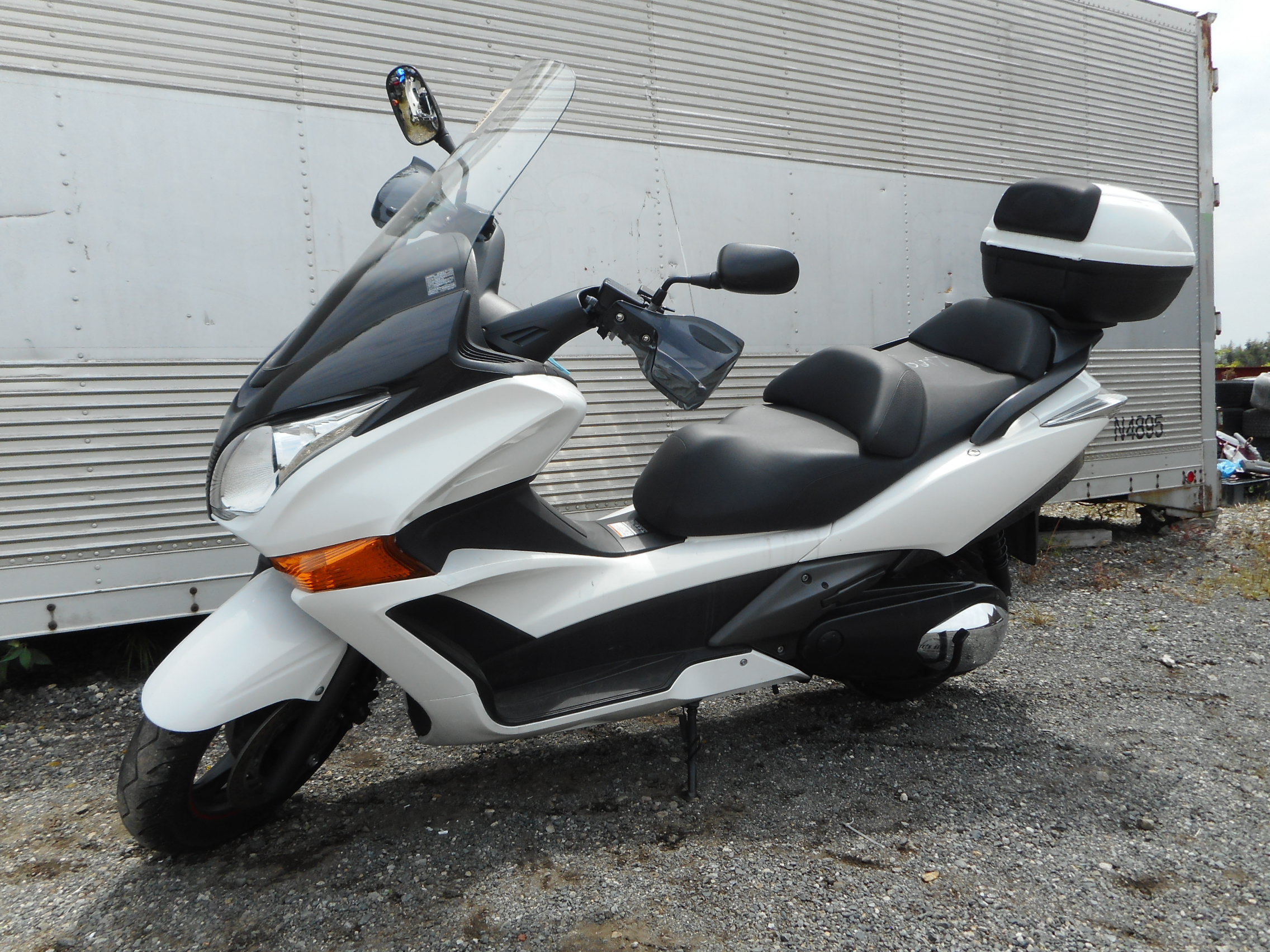 Honda wing 400. Honda Silver Wing 400 gt. Honda Silver Wing линзы. Honda gt 160.